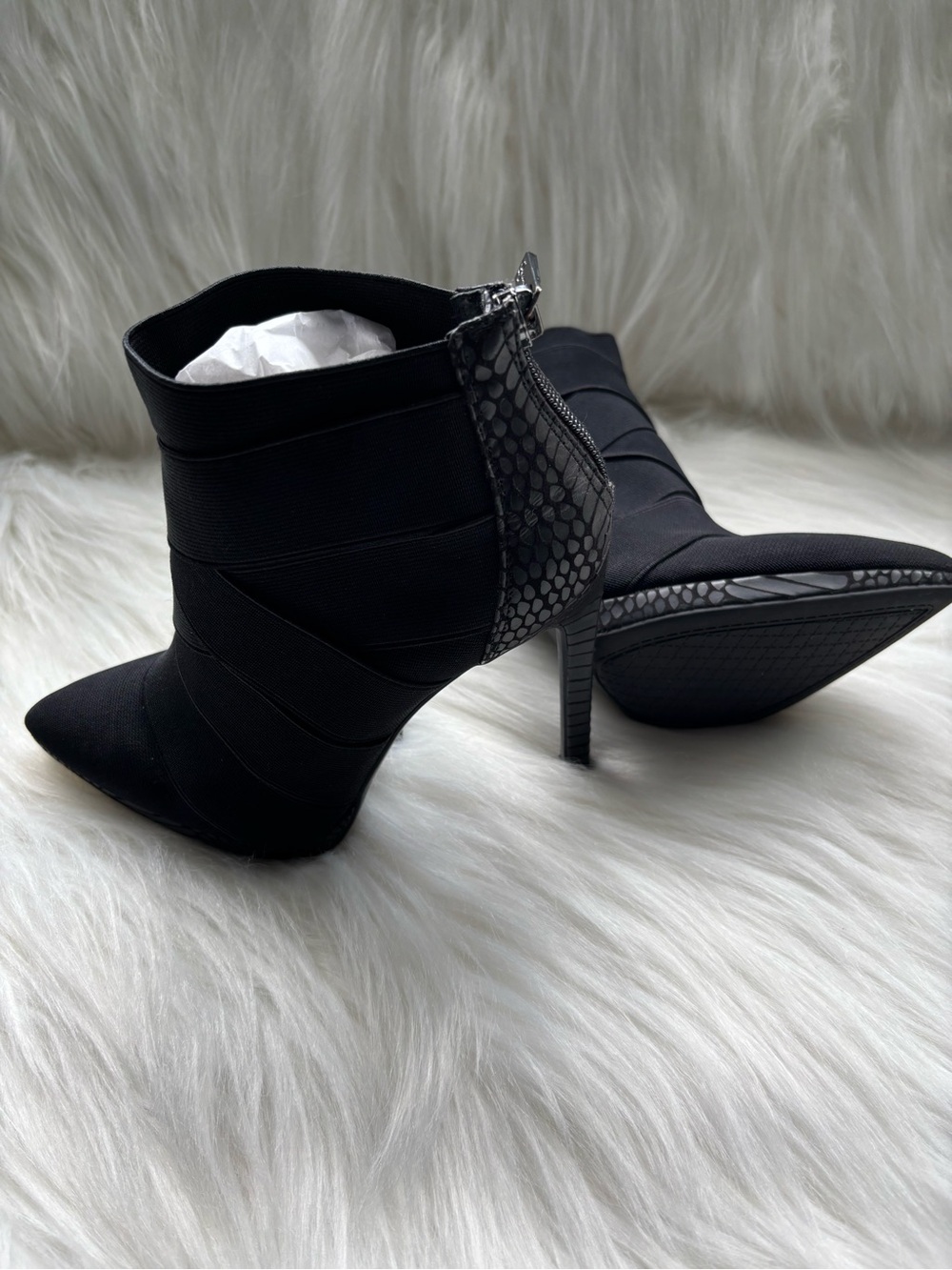Jessica Simpson, sleek ankle booty stiletto heels reptile trim. 6 1/2 $65.